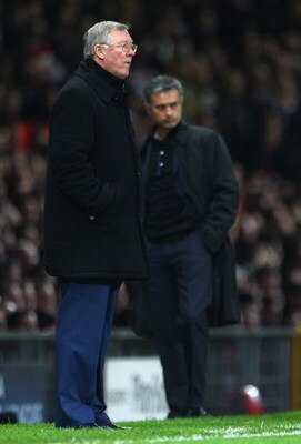 MANCHESTER, UNITED KINGDOM - MARCH 11:  Manchester United Manager Sir Alex Ferguson (L) and Inter Milan Manager Jose Mourinho watch the action during the UEFA Champions League Round of Sixteen, Second Leg match between Manchester United and Inter Milan at