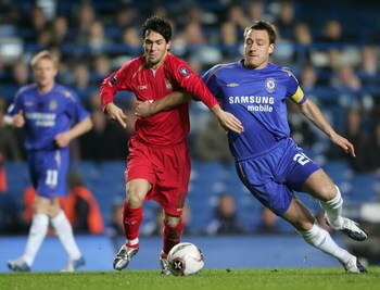 LONDON - DECEMBER 06:  John Terry of Chelsea battles with Luis Garcia of Liverpool during the UEFA Champions League Group G match between Chelsea and Liverpool at Stamford Bridge on December 6, 2005 in London, England.  (Photo by Jamie McDonald/Getty Imag