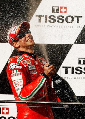 PHILLIP ISLAND, AUSTRALIA - OCTOBER 05: Casey Stoner of Australia and the Ducati Team celebrates with champagne on the podium after winning the Australian MotoGP at the Phillip Island Circuit on October 5, 2008 in Phillip Island, Australia. (Photo by Qu