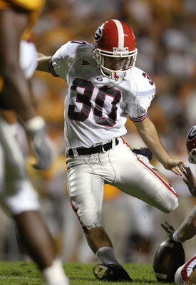 KNOXVILLE, TN - OCTOBER 11:  Billy Bennett #30 of Georgia Bulldogs kicks the point after their touchdown the the second quarter against Tennessee Volunteers October 11,2003 at Neyland Stadium in Knoxville, Tennessee.  (Photo by Elsa/Getty Images)