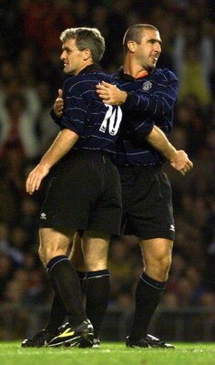 11 Oct 1999;  Mark Hughes and Eric Cantona together during  Sir Alex Ferguson testimonial, Manchester United v The Rest Of The World XI at Old Trafford, Manchester. Mandatory Credit: Ross Kinnaird/ALLSPORT