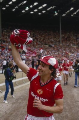 LONDON - MAY 18:  Bryan Robson of Manchester United celebrates winning the cup after the FA Cup Final match between Manchester United and Everton held on May 18, 1985 at Wembley Stadium, in London, England. Manchester United won the cup and match 1-0 afte