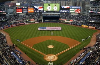 NEW YORK - APRIL 03:  A general view of Yankee Stadium during the playing of the National Anthem before the New York Yankees game against the Chicago Cubs at Yankee Stadium on April 3, 2009 in the Bronx borough of New York City. Today's exhibition game is