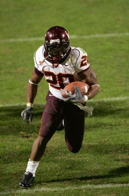 COLLEGE PARK, MD - OCTOBER 20:  Running back Mike Imoh #20 of the Virginia Tech Hokies runs with the ball against the Maryland Terrapins at Byrd Stadium on October 20, 2005 in College Park, Maryland. Virginia Tech defeated Maryland 28-9.  (Photo by Jamie 