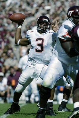 COLLEGE STATION, TEXAS - SEPTEMBER 21:  Quarterback Bryan Randall #3 of the Virginia Tech Hokies drops back to pass against the Texas A&M Aggies on September 21, 2002 at Kyle Field in College Station, Texas.   Virginia Tech defeated Texas A&M 13-3.  (Phot