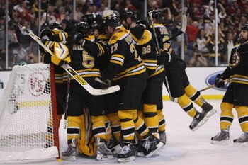 BOSTON - APRIL 19:  The Boston Bruins celebrate a win over the Montreal Canadiens during game six of the 2008 NHL Stanley Cup Playoffs Eastern Conference Quarterfinals series on April 19, 2008 at the TD Banknorth Garden in Boston, Massachusetts. The Bruin
