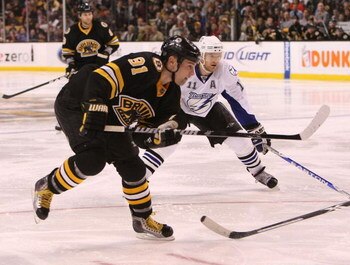 BOSTON - MARCH 31: Marc Savard #91 of the Boston Bruins skates against the Tampa Bay Lightning on March 31, 2009 at the TD Banknorth Garden in Boston. (Photo by Bruce Bennett/Getty Images)