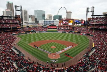 ST. LOUIS - APRIL 06:  The  St. Louis Cardinals and the Pittsburgh Pirates line up before the start of the game during Opening Day on April 6, 2009  at Busch Stadium in St. Louis, Missouri.  (Photo by Elsa/Getty Images)