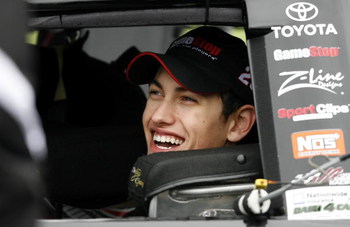 LEBANON, TN - APRIL 11: Joey Logano, driver of the #20 GameStop Toyota talks with crew members before qualifying for the NASCAR Nationwide Series Pepsi 300 at the Nashville Superspeedway on April 11, 2009, in Lebanon, Tennessee. (Photo by John Sommers