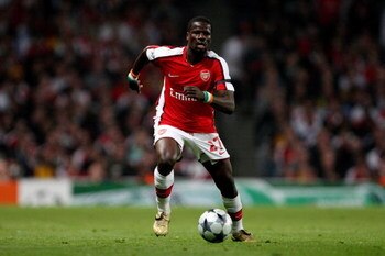 LONDON, ENGLAND - APRIL 15:  Emmanuel Eboue of Arsenal runs with the ball during the UEFA Champions League Quarter Final Second Leg match between Arsenal and Villarreal at the Emirates Stadium on April 15, 2009 in London, England.  (Photo by Hamish Blair/