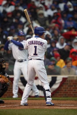 CHICAGO - APRIL 13:  Kosuke Fukudome #1 of the Chicago Cubs bats against the Colorado Rockies during the Opening Day game on April 13, 2009 at Wrigley Field in Chicago, Illinois. The Cubs defeated the Rockies 4-0. (Photo by Jonathan Daniel/Getty Images) 
