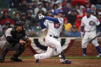 CHICAGO - APRIL 13:  Mike Fontenot #17 of the Chicago Cubs bats against the Colorado Rockies during the Opening Day game on April 13, 2009 at Wrigley Field in Chicago, Illinois. The Cubs defeated the Rockies 4-0. (Photo by Jonathan Daniel/Getty Images) 