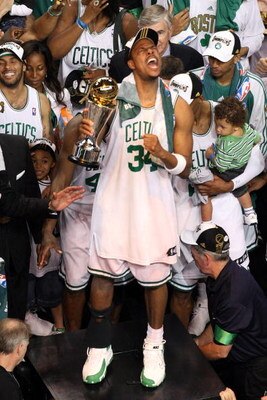 BOSTON - JUNE 17:  Paul Pierce #34 of the Boston Celtics celebrates with the NBA Finals MVP trophy after defeating the Los Angeles Lakers in Game Six of the 2008 NBA Finals on June 17, 2008 at TD Banknorth Garden in Boston, Massachusetts. NOTE TO USER: Us