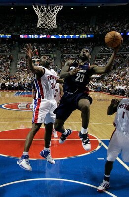 AUBURN HILLS, MI - MAY 31:  LeBron James #23 of the Cleveland Cavaliers drives for a shot attempt against Dale Davis #34 of the Detroit Pistons in Game Five of the Eastern Conference Finals during the 2007 NBA Playoffs at The Palace of Auburn Hills on May