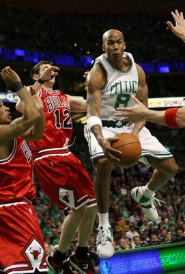BOSTON - APRIL 18:  Stephon Marbury #8 of the Boston Celtics passes the ball as he is pressured by Kirk Hinrich #12 of the Chicago Bulls in Game One of the Eastern Conference Quarterfinals during the 2009 NBA Playoffs at TD Banknorth Garden on April 18, 2