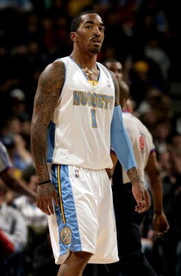 DENVER - MARCH 05:  J.R. Smith #1 of the Denver Nuggets awaits action against the Portland Trail Blazers during NBA action at the Pepsi Center on March 5, 2009 in Denver, Colorado. The Nuggets defeated the Trail Blazers 106-90. NOTE TO USER: User expressl