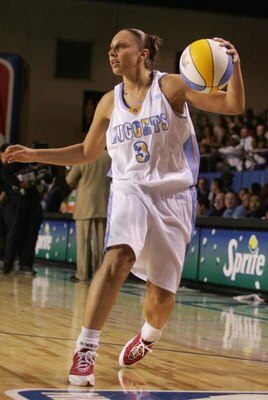 DENVER - FEBRUARY 18:  WNBA athlete Diana Taurasi handles the ball during the McDonald's NBA All-Star Celebrity Game at the Colorado Convention Center on February 18, 2005 in Denver, Colorado.  (Photo by Mark Mainz/Getty Images)