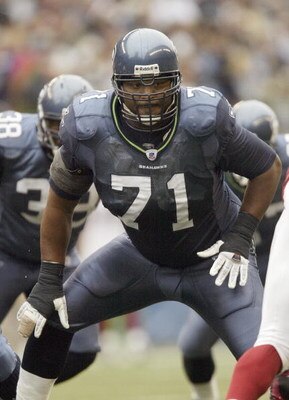 SEATTLE - SEPTEMBER 17:  Tackle Walter Jones #71 of the Seattle Seahawks gets ready for the snap against the Arizona Cardinals at Qwest Field on September 17, 2006 in Seattle, Washington. The Seahawks won 21-10. (Photo by Otto Greule Jr/Getty Images) 