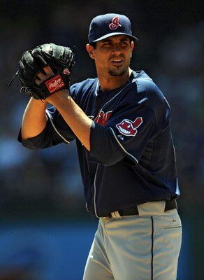 ARLINGTON, TX - APRIL 09:  Pitcher Carl Pavano #44 of the Cleveland Indians throws against the Texas Rangers on April 9, 2009 at Rangers Ballpark in Arlington, Texas.  (Photo by Ronald Martinez/Getty Images)