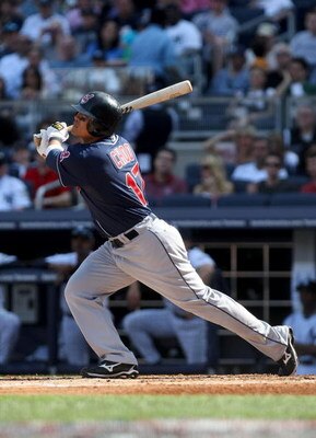 NEW YORK - APRIL 18:  Shin-Soo Choo #17 of the Cleveland Indians hits a three run home run in the second inning against the New York Yankees at Yankee Stadium on April 18, 2009 in the Bronx borough of New York City.  (Photo by Nick Laham/Getty Images)