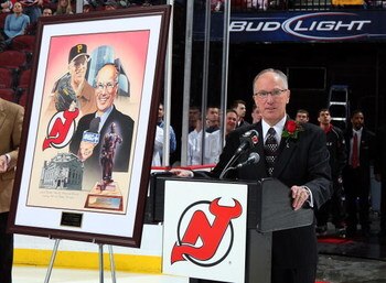 NEWARK, NJ - JANUARY 30:  Television announcer Mike 'Doc' Emrick speaks to the fans as he is honored prior to the Pittsburgh Penguins playing the New Jersey Devils at the Prudential Center on January 30, 2009 in Newark, New Jersey.  (Photo by Jim McIsaac/
