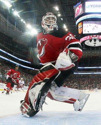 NEWARK, NJ - APRIL 15: Martin Brodeur #30 of the New Jersey Devils tends net against the Carolina Hurricanes during game one of the 2009 NHL Eastern Conference Quarterfinals at Prudential Center on April 15, 2009 in Newark, New Jersey. (Photo by Bruce Ben