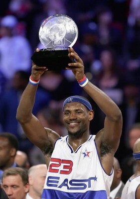 HOUSTON - FEBRUARY 19:  LeBron James #23 of the East Team holds up the MVP trophy after leading the East to a 122-120 victory over the West in the 2006 NBA All-Star Game at the Toyota Center on February 19, 2006 in Houston, Texas. James put up 29 points i