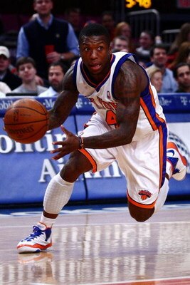 NEW YORK - JANUARY 23:  Nate Robinson #4 of the New York Knicks dribbles the ball to the basket during the game against the Memphis Grizzlies at Madison Square Garden January 23, 2009 in New York City. NOTE TO USER: User expressly acknowledges and agrees 