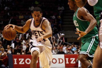 EAST RUTHERFORD, NJ - OCTOBER 16:  Devin Harris #34 of the New Jersey Nets dribbles up court during the second half of a pre-season game against the Boston Celtics at the IZOD Center on October 16, 2008 in East Rutherford, New Jersey. The Celtics won 111-