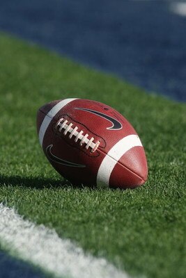 PASADENA, CA - JANUARY 1:  Detail view of a football resting on the grass during the game between the Penn State Nittany Lions and teh USC Trojans on January 1, 2009 at the Rose Bowl in Pasadena, California.  USC won 38-24.  (Photo by Jeff Golden/Getty Im