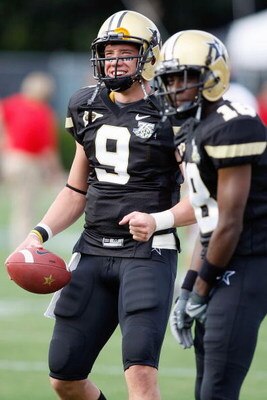 TALLADEGA, AL - SEPTEMBER 15:  Quarterback Mackenzi Adams #9 of the Vanderbilt Commodores looks to throw a pass during warmup before playing the Ole Miss Rebels on September 15, 2007 at Vanderbilt Stadium in Nashville, Tennessee.  (Photo by Chris Graythen