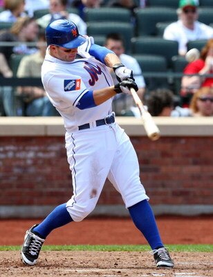 NEW YORK - APRIL 18:  David Wright #5 of the New York Mets bats in the fifth inning against the Milwaukee Brewers on April 18, 2009 at Citi Field in the Flushing neighborhood of the Queens borough of New York City.  (Photo by Jim McIsaac/Getty Images)