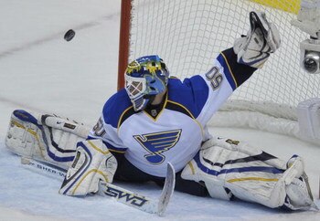 VANCOUVER, CANADA - APRIL 17: Chris Mason #50 of the St. Louis Blues deflects a shot by  of the Vancouver Canucks during Game Two of the Western Conference Quarterfinals of the 2009 Stanley Cup Playoffs on April 17, 2009 at General Motors Place in Vancouv
