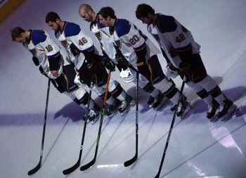 GLENDALE, AZ - APRIL 07:  The St. Louis Blues stand attended during the National Anthem before the NHL game against the Phoenix Coyotes at Jobing.com Arena on April 7, 2009 in Glendale, Arizona.  The Blues defeated the Coyotes 5-1.  (Photo by Christian Pe