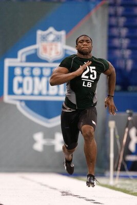 INDIANAPOLIS, IN - FEBRUARY 23:  Linebacker Clint Sintim of Virginia runs the 40 yard dash during the NFL Scouting Combine presented by Under Armour at Lucas Oil Stadium on February 23, 2009 in Indianapolis, Indiana. (Photo by Scott Boehm/Getty Images)