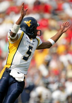 COLLEGE PARK, MD - SEPTEMBER 17:  Quarterback Pat White #5 of West Virginia celebrates after a touchdown during the second half of the game against Maryland on September 17, 2005 at Byrd Stadium in College Park, Maryland.  (Photo by Jamie Squire/Getty Ima