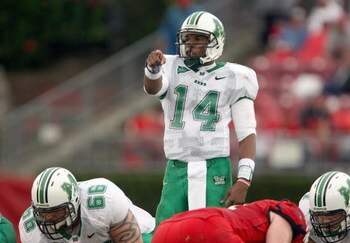HOUSTON - NOVEMBER 17: Bernard Morris #14 of the Marshall Thundering Herd calls the play during the game with the Houston Cougars at Robertson Stadium November 17, 2007 in Houston, Texas. Houston won 35-28. (Photo by Stephen Dunn/Getty Images)