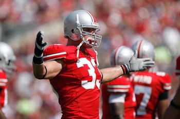 COLUMBUS, OH - SEPTEMBER 20: James Laurinaitis #33 of the Ohio State Buckeyes celebrates on the field during the game against the Troy Trojans on September 20, 2008 at Ohio Stadium in Columbus, Ohio. Ohio State won the game 28-10. (Photo by Gregory Shamu