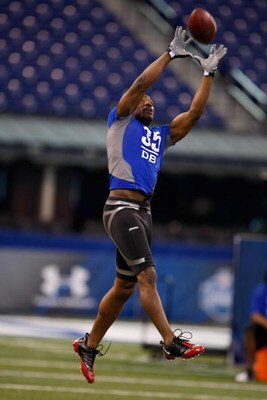INDIANAPOLIS, IN - FEBRUARY 24:  Defensive back William Moore of Missouri jumps in the air to catch the football during the NFL Scouting Combine at Lucas Oil Stadium on February 24, 2009 in Indianapolis, Indiana. (Photo by Scott Boehm/Getty Images)