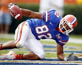 GAINESVILLE, FL - SEPTEMBER 30: Florida Gators receiver Louis Murphy #82 scores a touchdow against the Louisiana State Tigers at Ben Hill Griffin Stadium on October 7, 2006 in Gainesville, Florida. (Photo by Marc Serota/Getty Images)