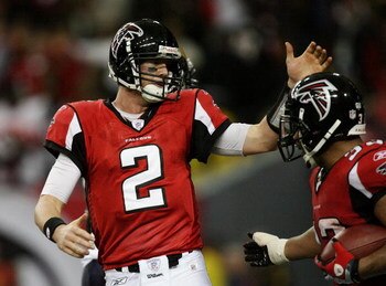ATLANTA - DECEMBER 28:  Quarterback Matt Ryan #2 of the Atlanta Falcons celebrates with running back Michael Turner #33 after Turner scored a touchdown against the St. Louis Rams at Georgia Dome on December 28, 2008 in Atlanta, Georgia.  (Photo by Doug Be