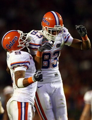 MIAMI - JANUARY 08:  David Nelson #83 and Louis Murphy #9 of the Florida Gators celebrate after a play against the Oklahoma Sooners in the FedEx BCS National Championship Game at Dolphin Stadium on January 8, 2009 in Miami, Florida.  (Photo by Donald Mira