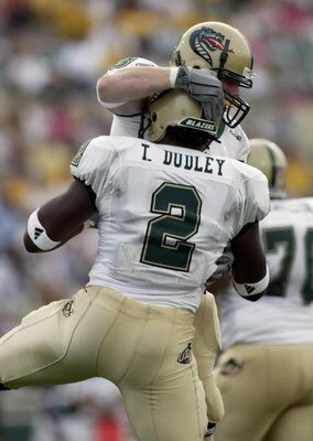 WACO, TX - AUGUST 30:  Running back Dan Burks #34 for the University of Alabama at Birmingham Blazers celebrates his touchdown with teammate running back Theron Dudley #2 against the Baylor University Bears during the game at Floyd Casey Stadium on August