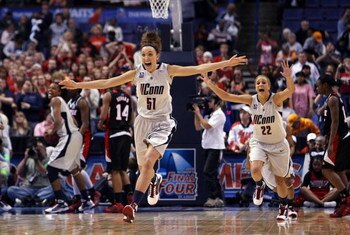 ST. LOUIS - APRIL 07:   Cassie Kerns #51 and Meghan Gardler #22 of the Connecticut Huskies celebrate the win at the buzzer during the NCAA Women's Final Four Championship game against the Louisville Cardinals at the Scottrade Center on April 7, 2009 in St