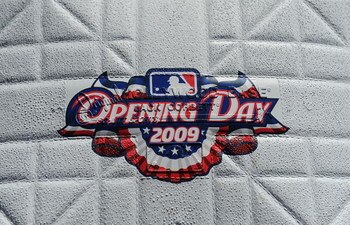 ARLINGTON, TX - APRIL 6:  The 'Opening Day 2009' logo is seen on a base before a game between the Cleveland Indians and the Texas Rangers during the home opener at Rangers Ballpark April 6, 2009 in Arlington, Texas.  (Photo by Ronald Martinez/Getty Images