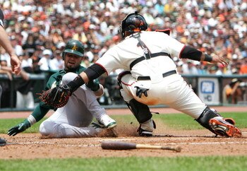 SAN FRANCISCO - JUNE 10:  Bengie Molina #1 of the San Francisco Giants tags out Nick Swisher #33 of the Oakland Athletics on a fielders choice hit by Dan Johnson in the fourth inning on June 10, 2007 at AT&T Park in San Francisco, California.  (Photo by J