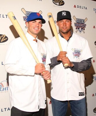 NEW YORK - APRIL 03:  David Wright of the New York Mets and Derek Jeter of the New York Yankees attend Delta's Jeter/Wright batting challenge at the Stone Rose Lounge on April 3, 2009 in New York City.  (Photo by Stephen Lovekin/Getty Images)