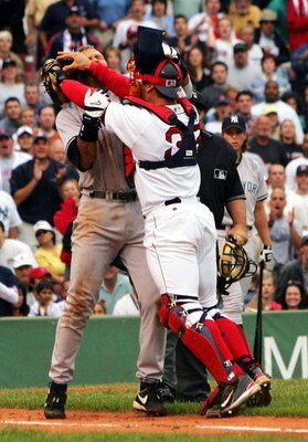 BOSTON - JULY 24:  Alex Rodriguez #13 of the New York Yankees gets into a fight with catcher Jason Varitek #33 of the Boston Red Sox after Rodriguez was hit by a pitch by pitcher Bronson Arroyo in the third inning on July 24, 2004 at Fenway Park in Boston
