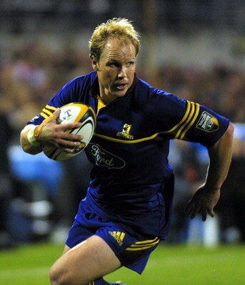 NEW ZEALAND - MAY 18:  Highlanders Jeff Wilson runs in a try during the rugby Super 12 semi final between the Crusaders and the Highlanders played at Jade Stadium, Saturday. The Crusaders won 3423.  (Photo by Michael Bradley/Getty Images)