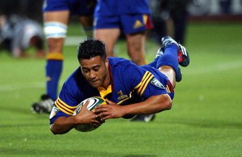 DUNEDIN, NEW ZEALAND - MARCH 02:  Romi Ropati gets the Highlanders 5th try during the Super 12 Rugby game, Sharks vs Highlanders played at Carisbrook, Saturday. The Highlanders won 455.  (Photo by Dean Purcell/Getty Images)